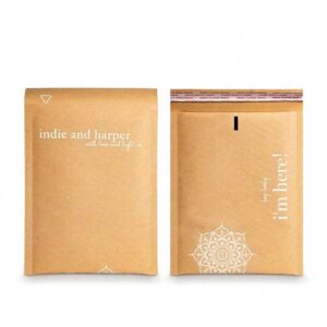 Eco-friendly natural brown kraft padded envelopes with minimalist aesthetic branding and strong self-seal adhesive.