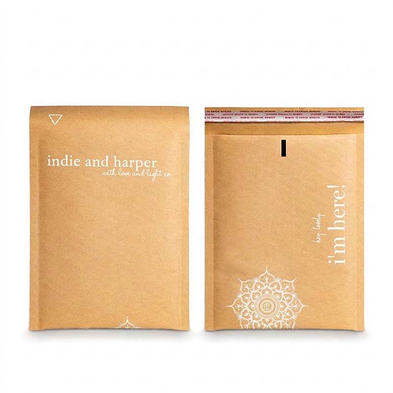 Eco-friendly natural brown kraft padded envelopes with minimalist aesthetic branding and strong self-seal adhesive.