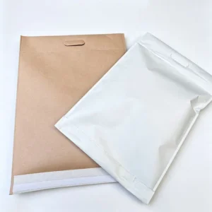 Custom reinforced kraft mailers with handle in natural kraft and white finishes for heavier shipping orders