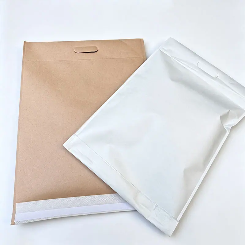 Custom reinforced kraft mailers with handle in natural kraft and white finishes for heavier shipping orders