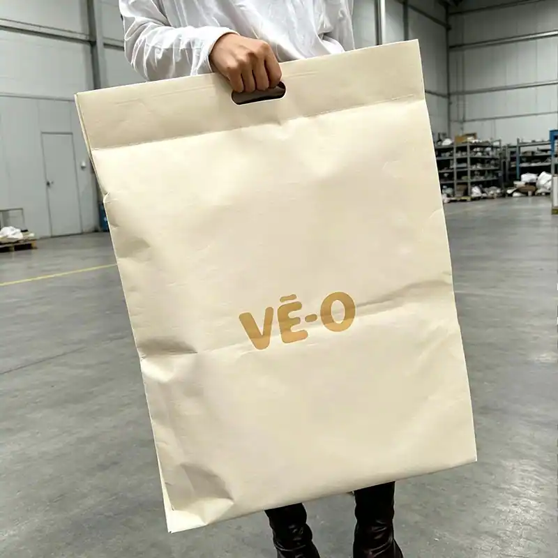 Heavy-duty shipping mailer with a die-cut handle for easier carrying of heavier sealed parcels