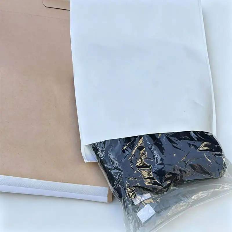 Reinforced kraft mailer packing a bulky apparel order for heavier e-commerce shipping